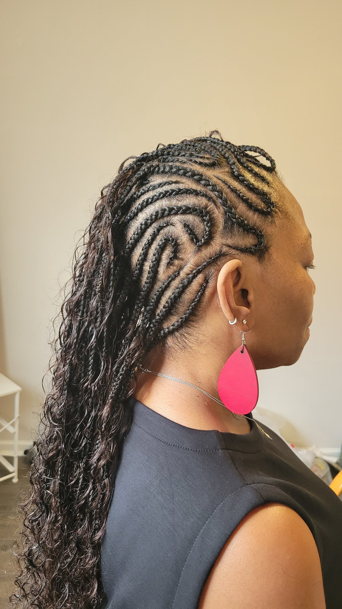 Patterned cornrows with curls, view 1