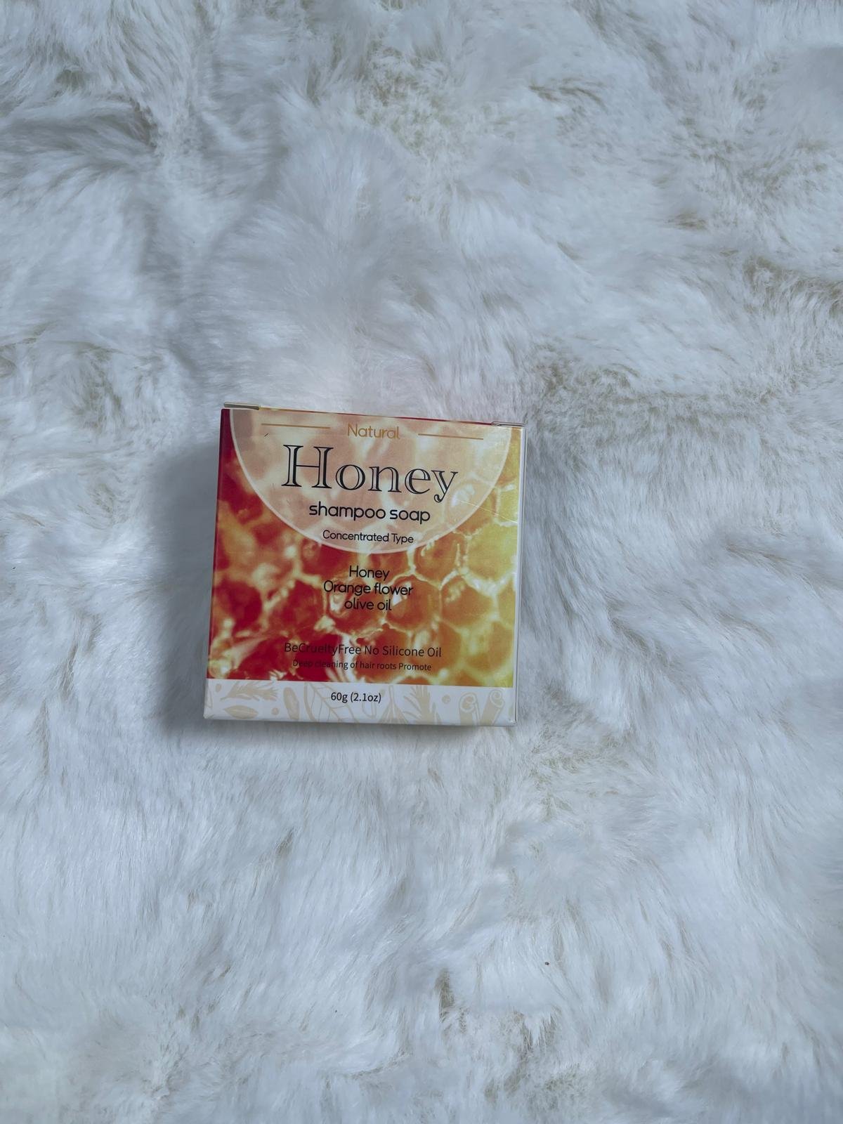 Honey Shampoo Soap box on a white fur background